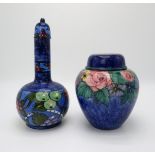 MARY A RAMSAY FOR STRATHYRE POTTERY GINGER JAR AND COVER the dark blue ground with painted flower