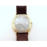 AN 18CT GOLD EBEL QUARTZ  With bi colour gold case, grey dial with gold dot and Roman numerals, with