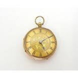 AN OPEN FACE FOB WATCH made in 18ct gold, with all over geometric and floral engraving to the