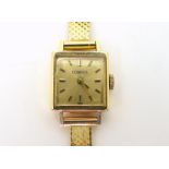 A LADIES CONSUL WATCH made in 18ct gold with mesh strap stamped 750. the case is 1.6cm, the strap