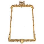 A 19TH CENTURY GILT FRAMED PIER MIRROR  with ribbon surmount over floral foliate mouldings around