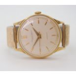 AN INTERNATIONAL WATCH CO AUTOMATIC WATCH with a gold plated case, cream dial with gold coloured