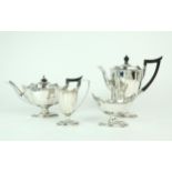 A VICTORIAN FOUR PIECE SILVER TEA SERVICE by Thomas Bradbury, London 1898, in the neo-classical