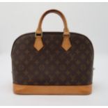 A LOUIS VUITTON M51130 BROWN MONOGRAM ALMA with a dust bag, personalised to the leather 'C P',