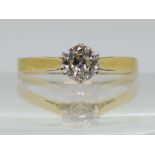 A DIAMOND SOLITAIRE RING the 18ct gold shank with classic crown mount is set with an estimated