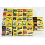 A collection of boxed Vanguards 1:43 and 1:64-scale diecast model vehicles, both domestic and