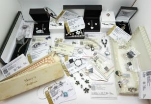 A collection of silver gem set Gems TV jewellery to include, Ethiopian opal rings and earrings,