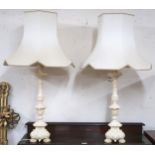 A pair of cream table lamps and shades Condition Report:Available upon request