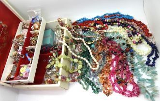 A collection of Gems TV, gemstone beads to include fluorite, coral, pearls, lapis lazuli, and