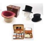 Two silk top hats: one by Keith Scott, Dundee and contained in a leather case (small size, measuring
