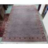 A light blue ground Bokhara rug with all-over patterned ground with multicoloured border, 390cm long