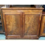 A Victorian mahogany linen press with pair of panel doors concealing drawers on plinth base, 118cm