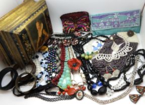 Vintage bead necklaces to include Vaseline glass, peacock beads, deco beads, a cinnabar style bangle