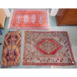 A lot comprising terracotta ground Persian style rug with four multicoloured medallions and blue