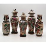 A collection of Chinese Famille Rose Nanking 'warrior vases', one a pair with lids and three