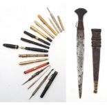 A collection of early-mid 20th century fountain pens and related articles, including a Mont Blanc