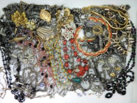 A Japanese beaded shawl, and a collection of vintage costume jewellery to include Sarah Coventry,