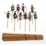 A characterful set of ten Eastern miniature stick puppets; and a suite of metal-mounted chopsticks