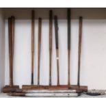 A lot of nine assorted croquet mallets, associated pieces etc  Condition Report:Available upon