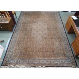 A blue and beige patterned ground Prado Orient Keshan super rug with diamond central medallion,