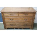 A late Victorian chest of drawers with two over two drawers over shaped frieze, 77cm high x 115cm