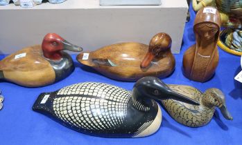 Four wooden decoy ducks, two by Dan Brown, another by Jennings and a further one stamped Hebert