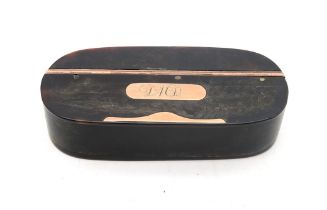 A tortoiseshell snuffbox with yellow metal hardware, the lid inset with a plaque engraved "D.