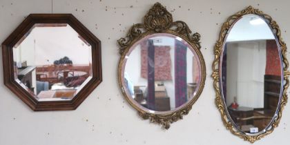 A lot comprising pair of gilt framed bevelled glass wall mirrors and another octagonal framed