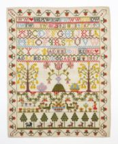 A VICTORIAN NEEDLEWORK SAMPLER Dated 1885, unmounted and unusually well-preserved, the field