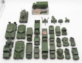 A collection of military Dinky Toy model vehicles, including three Supertoys Centurion tanks and