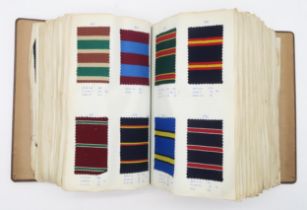 Two large binders of weavers' "regimental tie" pattern/fabric samples (2) Condition Report:Available