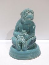 a Beswick monkey in turquoise glaze, no 397 Condition Report:Available upon request