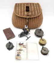 Fishing tackle, comprising a wicker creel, four various reels to include Millbro and Pridex by J.