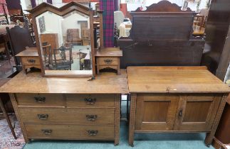 A late Victorian oak dressing chest with adjustable mirror on drawered superstructure on base with