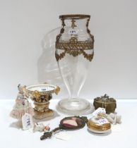 A Bohemian hand mirror, painted with a maiden, a glass vase with ormolu mounts, a Derby dish, a