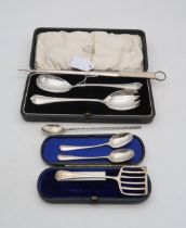 A collection of silver including a cased cake server set, by Cooper Brothers & Sons, Sheffield, a