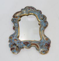 A champleve enamelled mirror, of rococo style Condition Report:Mirror is 24cm high