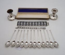 A collection of silver including two Thai white metal bracelets, a set of silver seal top spoons,