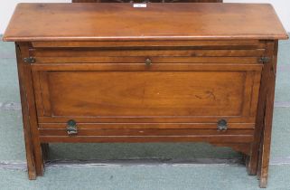 A late 19th/early 20th century walnut and canvas officers campaign bed with rectangular hinged top