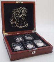 The complete set of American eagle silver dollars coin set. Five coins dating 2008, 2013, 2015,