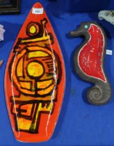 A Poole pottery spear shaped dish, shape number 82, together with a Beswick seahorse shaped dish