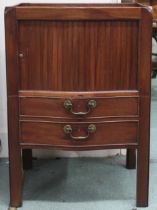 A 19th century mahogany bow front commode with galleried top over tambour door over two faux drawers