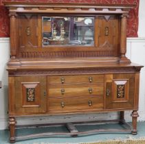 An early 20th century mahogany mirror backed sideboard with moulded cornice over bevelled glass