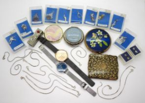 Ten silver bracelets, a collection of silver charms and pendants, two Skagen watches, a Estee Lauder