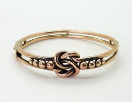 A 9ct gold knot pattern vintage bangle, inner diameter 5.8cm, weight 15.2gms Condition Report: