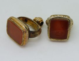 A Victorian seal ring, in rolled gold with monogramed carnelian seal stone, approximately O1/2,