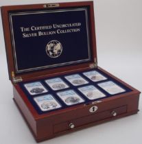 The Certified Uncirculated Silver Bullion Collection, eight coins in a wood collector's cabinet .