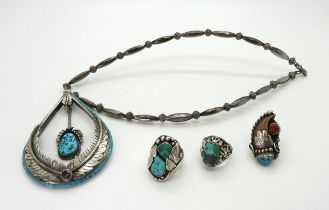 A collection of Navajo jewellery, to include a turquoise set feather statement necklace, signed N (