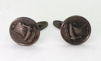 A pair of Georg Jensen silver Viking longship cufflinks, pattern number 50 in Original Georg