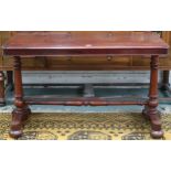A Victorian mahogany hall table with rectangular top on pair of turned column supports joined by
